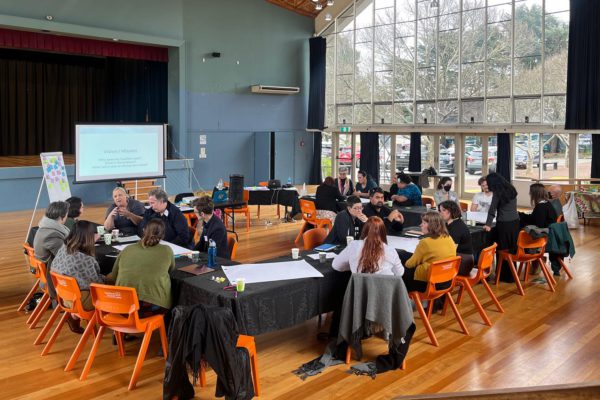 A photo of participants discussing at the event